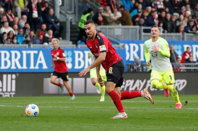 12.11.2023, xavx, Fussball 2.Bundesliga, SV Wehen Wiesbaden - 1.FC Kaiserslautern emspor, v.l. Ivan Prtajin (SV Wehen Wiesbaden), Marlon Ritter (1.FC Kaiserslautern) (DFL DFB REGULATIONS PROHIBIT ANY USE OF PHOTOGRAPHS as IMAGE SEQUENCES and or QUASI-VIDEO) Wiesbaden