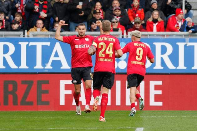 12.11.2023, xavx, Fussball 2.Bundesliga, SV Wehen Wiesbaden - 1.FC Kaiserslautern emspor, v.l. Ivan Prtajin (SV Wehen Wiesbaden), Marcus Mathisen (SV Wehen Wiesbaden), Thijmen Goppel (SV Wehen Wiesbaden) celebrate the goal, Der Torjubel zum 2:1 durch Robin Heußer (SV Wehen Wiesbaden) (DFL DFB REGULATIONS PROHIBIT ANY USE OF PHOTOGRAPHS as IMAGE SEQUENCES and or QUASI-VIDEO) Wiesbaden