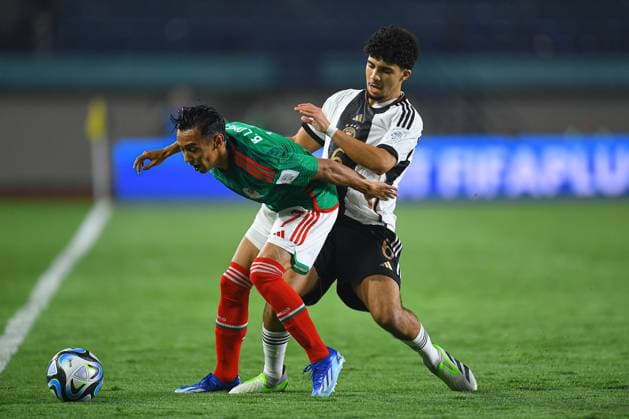 RECORD DATE NOT STATED FIFA U-17 World Cup Indonesia 2023 Mexico vs Germnay (L-R), Brandon Lomeli of Mexico and. Fayssal Harchaoui of Germany during the game Mexico vs Germany, corresponding to Group F of the FIFA U-17 World Cup Indonesia 2023, at Si Jalak Harupat Stadium, on November 12, 2023. <br><br> (I-D), Brandon Lomeli de Mexico y. Fayssal Harchaoui de Alemania durante el partido Mexico vs Alemania, correspondiente al Grupo F de la Copa Mundial de la FIFA Sub-17 Indonesia 2023, en el Estadio Si Jalak Harupat Stadium, el 12 de Noviembre de 2023. BANDUNG INDONESIA INDONESIA  Copyright: xAdrianxMaciasx 20231112060647_FWC_U17_GF_MEX_GER_LOMELI21