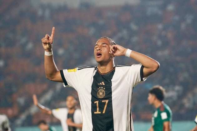 (231113) -- BANDUNG, Nov. 13, 2023 -- Eric Da Silva Moreira of Germany celebrates scoring during the group F match of the FIFA World Cup, WM, Weltmeisterschaft, Fussball U17, U 17 between Mexico and Germany at Jalak Harupat Stadium in Bandung, Indonesia, Nov. 12, 2023. (Photo by Xinhua) (SP)INDONESIA-BANDUNG-FIFA-WORLD CUP-U17-GROUP F-MEX VS GER SeptianjarxMuharam 