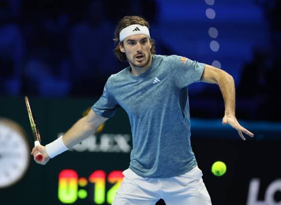 (231115) -- TURIN, Nov. 15, 2023 -- Stefanos Tsitsipas hits a return during the group stage match between Stefanos Tsitsipas of Greece and Holger Rune of Denmark at ATP, Tennis Herren Finals tennis tournament in Turin, Italy, on Nov. 14, 2023. (Photo by Xinhua) (SP)ITALY-TURIN-TENNIS-ATP FINALS AlbertoxLingria 