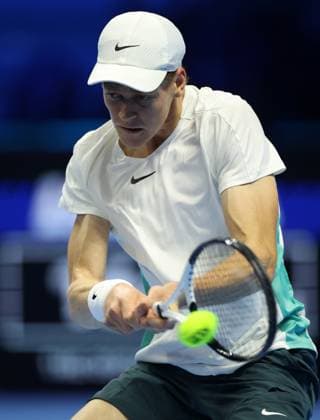(231115) -- TURIN, Nov. 15, 2023 -- Jannik Sinner hits a return during the group stage match between Novak Djokovic of Serbia and Jannik Sinner of Italy at ATP, Tennis Herren Finals tennis tournament in Turin, Italy, Nov. 14, 2023. (Photo by Xinhua) (SP)ITALY-TURIN-TENNIS-ATP FINALS AlbertoxLingria 
