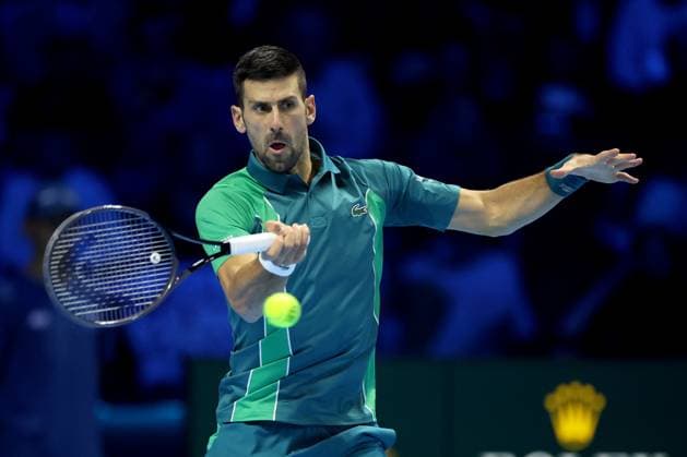 (231115) -- TURIN, Nov. 15, 2023 -- Novak Djokovic hits a return during the group stage match between Novak Djokovic of Serbia and Jannik Sinner of Italy at ATP, Tennis Herren Finals tennis tournament in Turin, Italy, Nov. 14, 2023. (Photo by Xinhua) (SP)ITALY-TURIN-TENNIS-ATP FINALS AlbertoxLingria 