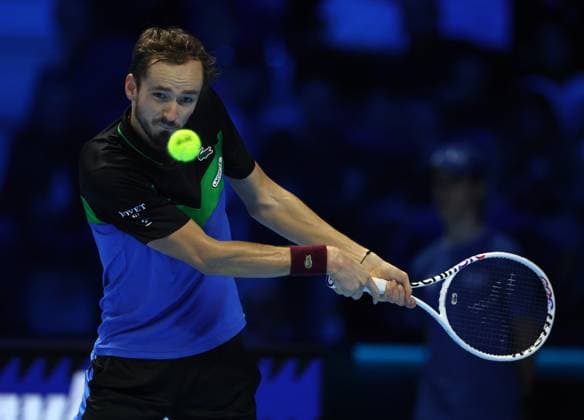 (231116) -- TURIN, Nov. 16, 2023 -- Daniil Medvedev hits a return during the group stage match between Daniil Medvedev of Russia and Alexander Zverev of Germany at ATP, Tennis Herren Finals tennis tournament in Turin, Italy, Nov. 15, 2023. (Photo by Xinhua) (SP)ITALY-TURIN-TENNIS-ATP FINALS AlbertoxLingria 