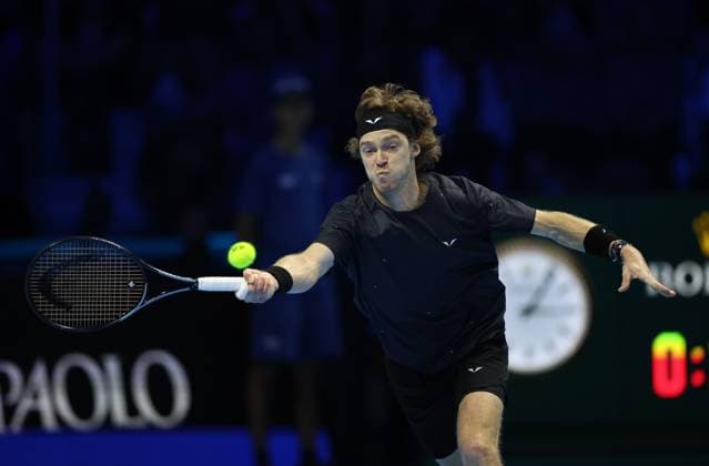 (231116) -- TURIN, Nov. 16, 2023 -- Andrey Rublev hits a return during the group stage match between Carlos Alcaraz of Spain and Andrey Rublev of Russia at ATP, Tennis Herren Finals tennis tournament in Turin, Italy, Nov. 15, 2023. (Photo by Xinhua) (SP)ITALY-TURIN-TENNIS-ATP FINALS AlbertoxLingria 