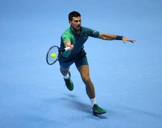 (231119) -- TURIN, Nov. 19, 2023 -- Novak Djokovic hits a return during the semifinal match between Carlos Alcaraz of Spain and Novak Djokovic of Serbia at ATP, Tennis Herren Finals tennis tournament in Turin, Italy, Nov. 18, 2023. (Photo by Xinhua) (SP)ITALY-TURIN-TENNIS-ATP FINALS AlbertoxLingria 