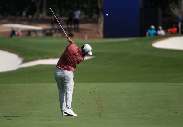 JON RAHM of Spain strikes the ball on the ninth fairway during DP World Tour Championship in Dubai, United Arab Emirates, Nov 19, 2023. Dubai United Arab Emirates  Copyright: xMARTINxDOKOUPILx 443_1758