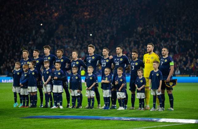 19th November 2023; Hampden Park, Glasgow, Scotland: Euro 2024 Qualifier Football, Scotland versus Norway; Scotland players line up for the national anthem  ActionPlus12577790 VagelisxGeorgariou