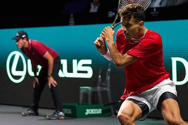 Gabriel Diallo of Canada returns a backhand to Otto Virtanen of Finland during the second Davis Cup Final 8 match between Canada and Finland at Palacio de Deportes Martin Carpena on November 21, 2023 in Malaga, Spain. (Photo by Camilla Stolen Imago) Malaga Spain Copyright: xCamillaxStolenx L1110742