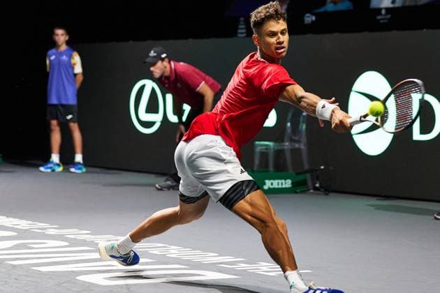 Gabriel Diallo of Canada returns a forehand to Otto Virtanen of Finland during the second Davis Cup Final 8 match between Canada and Finland at Palacio de Deportes Martin Carpena on November 21, 2023 in Malaga, Spain. (Photo by Camilla Stolen Imago) Malaga Spain Copyright: xCamillaxStolenx L1110747