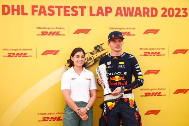 November 26, 2023, Abu Dhabi, United Arab Emirates: Max Verstappen of Red Bull Racing is seen with Jamie Chadwick after receiving DHL Fastest Lap Award 2023 ahead of Formula 1 Abu Dhabi Grand Prix at Yas Marina Circuit on November 26, 2023 in Abu Dhabi, United Arab Emirates. Abu Dhabi United Arab Emirates - ZUMAz156 0367994057st Copyright: xBeataxZawrzelx