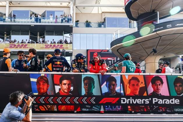 November 26, 2023, Abu Dhabi, United Arab Emirates: Sergio Perez of Red Bull Racing, Carlos Sainz of Ferrari and other drivers are seen during drivers parade ahead of Formula 1 Abu Dhabi Grand Prix at Yas Marina Circuit on November 26, 2023 in Abu Dhabi, United Arab Emirates. Abu Dhabi United Arab Emirates - ZUMAz156 0368014193st Copyright: xBeataxZawrzelx