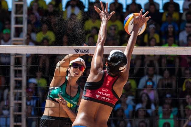 (231126) -- JOAO PESSOA, Nov. 26, 2023 -- Xue Chen (R) of China blocks during the women s semifinal match between Xue Chen Xia Xinyi of China and Ana Patricia Duda of Brazil at the World Beach volleyball, Beachvolleyball Pro Tour 2023 in Joao Pessoa, Brazil, Nov. 26, 2023. ) (SP)BRAZIL-JOAO PESSOA-BEACH VOLLEYBALL-WORLD PRO TOUR WangxTiancong 