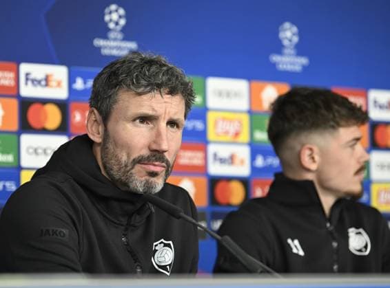Antwerp s head coach Mark van Bommel and Antwerp s Arbnor Muja pictured during a press conference, PK, Pressekonferenz of Belgian soccer team Royal Antwerp FC, on Monday 27 November 2023 in Hamburg, Germany. The team is preparing for tomorrow s game against Ukrainian club Shakhtar Donetsk, on day five of the Champions League group stage, in group H. TOM GOYVAERTS TomxGoyvaerts  x80933834x