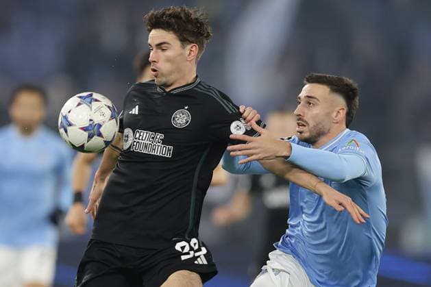 UEFA Champions League SS Lazio vs Celtic Football Club Celtic s Danish midfielder Matt O Riley challenges for the ball with Lazio™s Spanish defender Mario Gila during the UEFA Champions League match SS Lazio vs Celtic Football Club at Olimpico Stadium on November 28, 2023, in Rome. ABPH7145 Copyright: xAntonioxBalascox