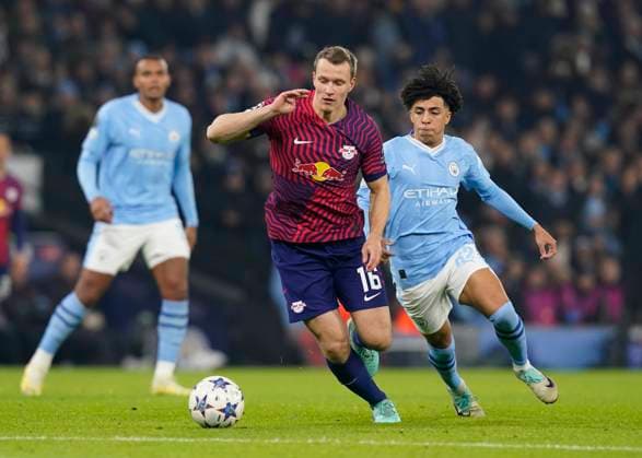 Manchester City v Leipzig - UEFA Champions League - Group G - Etihad Stadium November 28, 2023, MANCHESTER: Manchester, England, 28th November 2023. Lukas Klostermann of RB Leipzig tussles with Rico Lewis of Manchester City during the UEFA Champions League match at the Etihad Stadium, Manchester. (Credit Image: Ã‚Â Andrew Yates Sportimage Cal Media) MANCHESTER EDITORIAL USE ONLY Copyright: xx ZUMA-20231128_faf_si1_112.jpg AndrewxYatesx csmphotothree204784