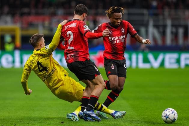 AC Milan vs Borussia Dortmund - UEFA Champions League 2023 24 Group Stage - Group F - 28 11 2023 Nico Schlotterbeck of Borussia Dortmund competes for the ball with Davide Calabria of AC Milan and Samuel Chukwueze of AC Milan during UEFA Champions League 2023 24 Group Stage - Group F football match between AC Milan and Borussia Dortmund at San Siro Stadium, Milan, Italy on November 28, 2023 - Photo FCI Fabrizio Carabelli Copyright: xBEAUTIFULxSPORTS Carabellix