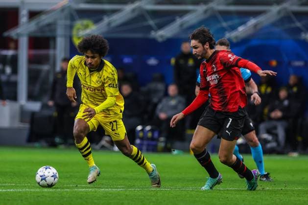 Karim Adeyemi of Borussia Dortmund scores a goal during UEFA Champions League 2023 24 Group Stage - Group F football match between AC Milan and Borussia Dortmund at San Siro Stadium, Milan, Italy on November 28, 2023  Copyright: xFabrizioxCarabelli IPAxSportx xix xx IPA_41920131 IPA_Agency_IPA41920131