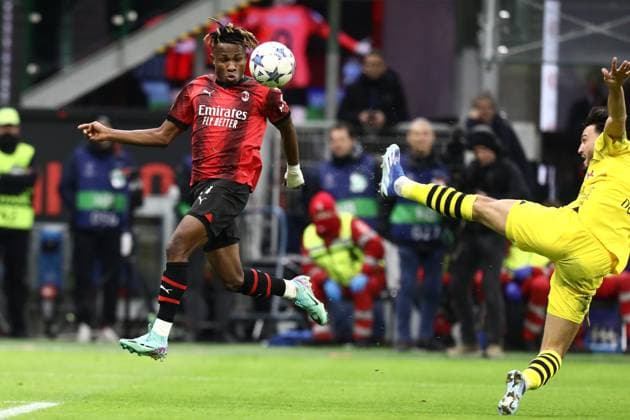 November 28, 2023, Milan, Lombardy, Italy: RAMY BENSEBAINI 5 of Borussia Dortmund tackles the ball which ens on SAMUEL CHUKWUEZE 21 of AC Milan in the UEFA Champions League Group Stage game between AC Milan and Borussia Dortmund on Tuesday November 28th 2023 at Stadio San Siro, Italy Milan Italy - ZUMAc179 20231128_zep_c179_076 Copyright: xMickaelxChavetx