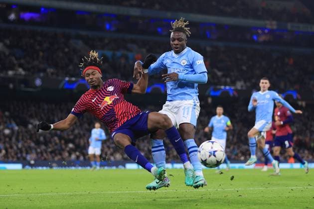 Football - UEFA Champions League - Group G - Manchester City v RB Leipzig 28th November 2023 - UEFA Champions League - Group G - Manchester City v RB Leipzig - Mohamed Simakan of RB Leipzig battles with Jeremy Doku of Manchester City - Photo: Simon Stacpoole Offside. Manchester UK Copyright: xSimonxStacpoolexOffside