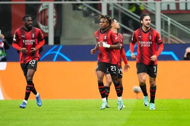 MILAN, ITALY - NOVEMBER 28: Samuel Chukwueze of Milan (R) celebrates his goal during the UEFA Champions League Group Stage match between AC Milan and Borussia Dortmund at Stadio Giuseppe Meazza on November 28, 2023 in Milan, Italy. Milan Stadio Giuseppe Meazza Italy Copyright: xJustPictures.ch JarixPestelaccix jp-en-EuSpIm-Milan_Dortmund_28Nov2023_JAR_00062