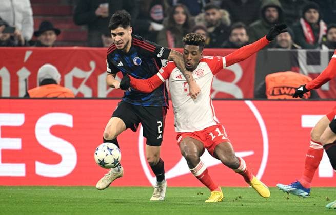 FUSSBALL CHAMPIONS LEAGUE SAISON 2023 2024 Vorrunde Gruppe A 5. Spieltag FC Bayern Muenchen - FC Kopenhagen 29.11.2023 Kevin Diks (li, FC Kopenhagen) gegen Kingsley Coman (re, FC Bayern Muenchen)