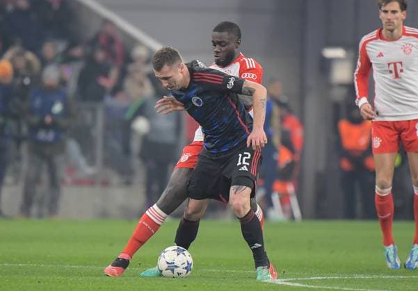 29.11.2023, xemx, Fussball UEFA Champions League, FC Bayern Muenchen - FC Kopenhagen emspor, v.l. Dayot Upamecano (FC Bayern Muenchen), Lukas Lerager (FC Kopenhagen) Zweikampf, Aktion, action, battle for the ball (DFL DFB REGULATIONS PROHIBIT ANY USE OF PHOTOGRAPHS as IMAGE SEQUENCES and or QUASI-VIDEO) Muenchen