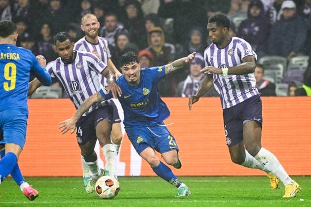 Toulouse s Cristian Casseres Jr., Union s Cameron Puertas Castro and Toulouse s Logan Costa fight for the ball during a soccer game French Toulouse FC and between Belgian Royale Union Saint Gilloise, on day 5 of the group phase of the UEFA Europa League competition, in group E, on Thursday 30 November 2023 in Toulouse, France. LAURIExDIEFFEMBACQ  x81205778x