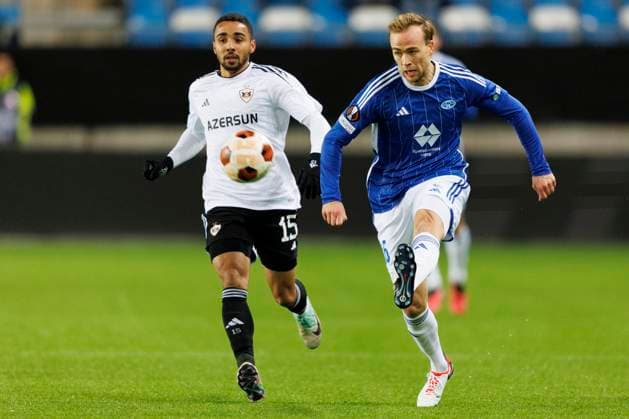 Europa League i fotball 2023: Molde - Qarabag (2-2) Molde 20231130. Qarabags Leandro Andrade (tv) og Martin Ellingsen under Europa League kampen i fotball mellom Molde og Qarabag pa Aker Stadion. Foto: Svein Ove Ekornesvag NTB Molde Norge EDITORIAL USE ONLY. RESTRICTED USE FOR BETTING COMPANIES Ref:_SPOZkeTyLM3NIo.jpg  Copyright: xSveinxOvexEkornesvagx xNTBx
