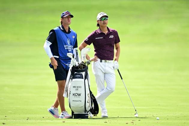 GOLF AUSTRALIAN OPEN, Min Woo Lee of Australia speaks to his caddy as he prepares to play a shot on the 12th fairway during Round 2 of the Australian Open 2023 at the Australian Golf Club in Sydney, Friday, December 1, 2023. ( NO ARCHIVING, EDITORIAL USE ONLY, NO USE IN BOOKS WITHOUT CONSENT SYDNEY NEW SOUTH WALES AUSTRALIA  Copyright: xDANxHIMBRECHTSx 20231201001872260703