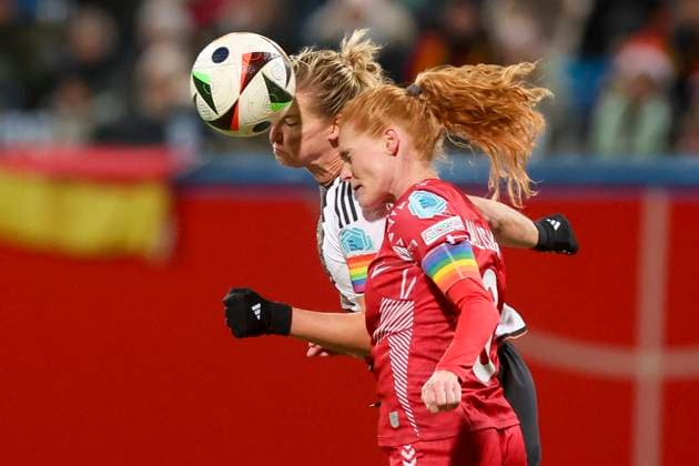 Germany, Rostock, 01.12.2023, Ostseestadion, Germany vs Denmark - UEFA Womens Nations League - Group A3, Alexandra Popp (Germany) und Stine Ballisager (Denmark) battle for the ball Rostock Ostseestadion Germany
