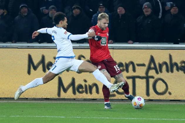 02.12.2023, xgox, Fussball 2.Bundesliga, 1.FC Magdeburg - 1.FC Kaiserslautern emspor, v.l. Malcolm Cacutalua (1.FC Magdeburg) Tymoteusz Puchacz (1. FC Kaiserslautern) Zweikampf, Aktion, action, battle for the ball (DFL DFB REGULATIONS PROHIBIT ANY USE OF PHOTOGRAPHS as IMAGE SEQUENCES and or QUASI-VIDEO) Magdeburg