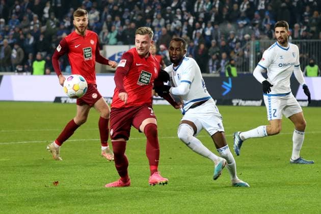 02.12.2023, xgox, Fussball 2.Bundesliga, 1.FC Magdeburg - 1.FC Kaiserslautern emspor, v.l. Marlon Ritter (1. FC Kaiserslautern) Silas Gnaka (1.FC Magdeburg) Zweikampf, Aktion, action, battle for the ball (DFL DFB REGULATIONS PROHIBIT ANY USE OF PHOTOGRAPHS as IMAGE SEQUENCES and or QUASI-VIDEO) Magdeburg