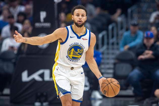 LOS ANGELES, CA - DECEMBER 02: Golden State Warriors guard Stephen Curry (30) dribbles in the first half of an NBA, Basketball Herren, USA basketball game between the Golden State Warriors and Los Angeles Clippers, Saturday, December 2, 2023, at Crypto.com Arena in Los Angeles, California. (Photo by Tony Ding Icon Sportswire) NBA: DEC 02 Warriors at Clippers EDITORIAL USE ONLY Icon46520231202002