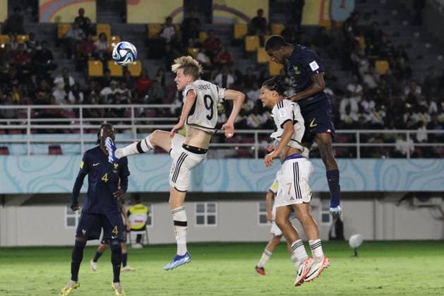 December 2, 2023, Surakarta, Central Java, Indonesia: YVANN TITI of France (R) heading the ball during FIFA U-17 World Cup Final match between Germany and France at Manahan Stadium. Surakarta Indonesia - ZUMAb228 20231202_zip_b228_015 Copyright: xAnggaxBudhiyantox