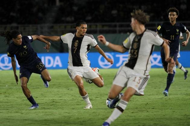 December 2, 2023, Surakarta, Central Java, Indonesia: PARIS BRUNNER of Germany (2L) vies with MATHIS AMOUGOU of France during FIFA U-17 World Cup Final match between Germany and France at Manahan Stadium. Surakarta Indonesia - ZUMAb228 20231202_zip_b228_016 Copyright: xAnggaxBudhiyantox
