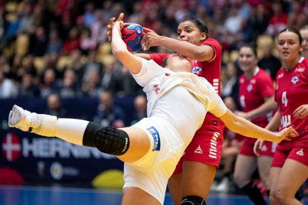 Denmark s Rikke Iversen with Chile s Catalina Francisca Moreno Cordova during the World Cup match between Denmark and Chile from group E during the IHF World Championship, WM, Weltmeisterschaft in women s handball in the preliminary round in the Jyske Bank Boxen in Herning, Sunday, December 3, 2023.. (Photo: Bo Amstrup Ritzau Scanpix) , Herning Denmark Mors