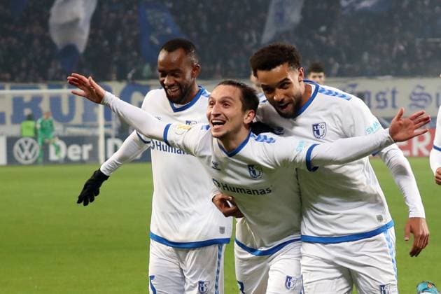 Sport Themen der Woche KW49 Sport Bilder des Tages 05.12.2023, xgox, Fussball DFB Pokal 1 8 Finale, 1.FC Magdeburg - Fortuna Düsseldorf emspor, v.l. Torjubel nach dem Tor zum celebrating the goal celebrate 1:0 durch Baris Atik (1.FC Magdeburg) (DFL DFB REGULATIONS PROHIBIT ANY USE OF PHOTOGRAPHS as IMAGE SEQUENCES and or QUASI-VIDEO) Magdeburg *** 05 12 2023, xgox, Fußball DFB Pokal 1 8 Finale, 1 FC Magdeburg Fortuna Düsseldorf emspor, v l Torjubel nach dem Tor zum celebrating the goal celebrate 1 0 durch Baris Atik 1 FC Magdeburg DFL DFB REGULATIONS PROHIBIT ANY USE OF PHOTOGRAPHS as IMAGE SEQUENCES and or QUASI VIDEO Magdeburg
