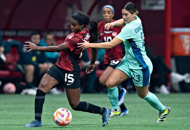 (231206) -- VANCOUVER, Dec. 6, 2023 -- Nichelle Prince (L) of Canada vies with Kyra Cooney-Cross (front R) of Australia during a women s International Friendly, Länderspiel, Nationalmannschaft football match in Vancouver, Canada, Dec. 5, 2023. (Photo by Xinhua) (SP)CANADA-VANCOUVER-FOOTBALL-WOMEN-FRIENDLY-CANADA VS AUSTRALIA AndrewxSoong 