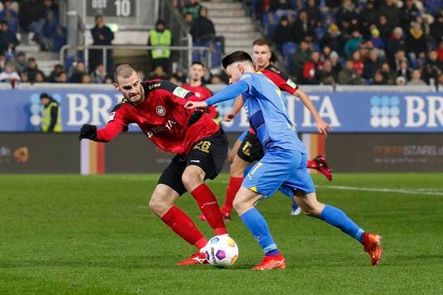 08.12.2023, xavx, Fussball 2.Bundesliga, SV Wehen Wiesbaden - Eintracht Braunschweig emspor, v.l. Aleksandar Vukotic (SV Wehen Wiesbaden), Maurice Multhaup (Eintracht Braunschweig) (DFL DFB REGULATIONS PROHIBIT ANY USE OF PHOTOGRAPHS as IMAGE SEQUENCES and or QUASI-VIDEO) Wiesbaden