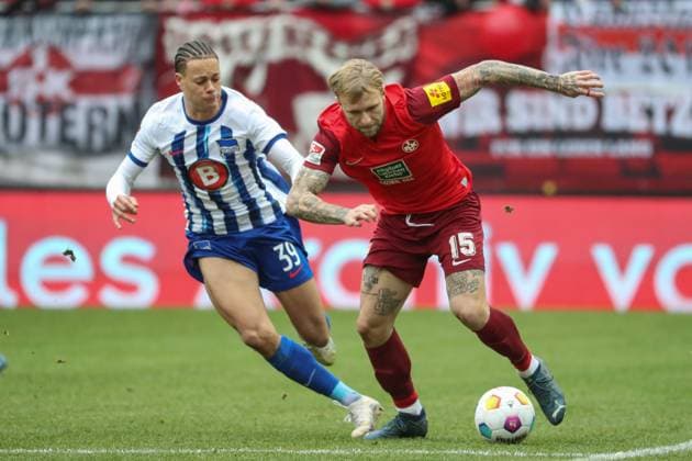 09.12.2023, xusrbx, Fussball 2.Bundesliga, 1.FC Kaiserslautern - Hertha BSC Berlin emspor, v.l. Derry Scherhant (Herta BSC, 39), Tymoteusz Puchacz (1. FC Kaiserslautern, 15), (DFL DFB REGULATIONS PROHIBIT ANY USE OF PHOTOGRAPHS as IMAGE SEQUENCES and or QUASI-VIDEO) Kaiserslautern