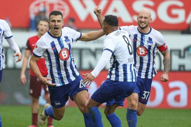 09.12.2023, xusrbx, Fussball 2.Bundesliga, 1.FC Kaiserslautern - Hertha BSC Berlin emspor, v.l. Marc Oliver Kempf (Herta BSC, 20), Bilal Hussein (Herta BSC, 8), Toni Leistner (Herta BSC, 37), Torjubel, zum 1:2 in der 82. Spielminute (DFL DFB REGULATIONS PROHIBIT ANY USE OF PHOTOGRAPHS as IMAGE SEQUENCES and or QUASI-VIDEO) Kaiserslautern