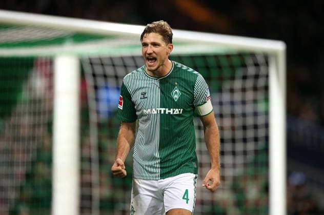 09.12.2023, Fussball 1. Bundesliga 2023 2024, 14. Spieltag, SV Werder Bremen - FC Augsburg, im Wohninvest Weserstadion Bremen. Niklas Stark (Werder Bremen) jubelt