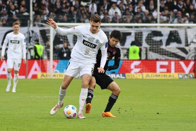 10.12.2023, Fussball, Herren, 2. Bundesliga, Saison 2023 2024, SV 07 Elversberg - 1. FC Nürnberg, Paul Stock (SV 07 Elversberg), Kanji Okunuki (1. FC Nürnberg) Elversberg Ursapharm-Arena an der Kaiserlinde Saarland Deutschland (DE)