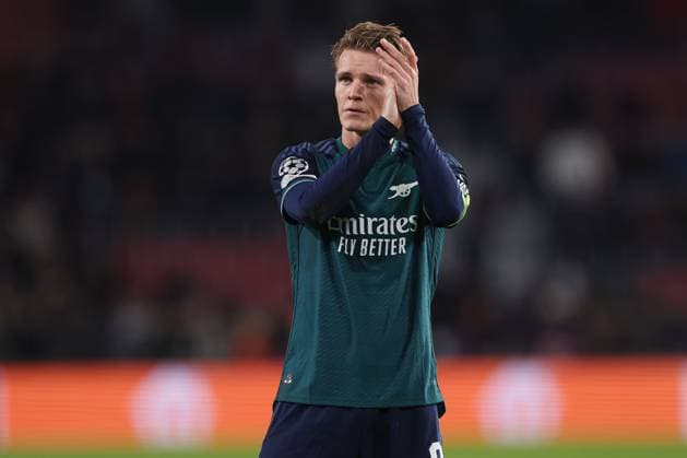 Martin Odegaard of Arsenal at the end of the match PSV Eindhoven v Arsenal, UEFA Champions League, Group B, Football, Philips Stadion, Eindhoven, Netherlands - 12 Dec 2023 EDITORIAL USE ONLY No use with unauthorised audio, video, data, fixture lists, club league logos or live services. Online in-match use limited to 120 images, no video emulation. No use in betting, games or single club league player publications. Copyright: xPaulxCurrie Shutterstockx 14254183cf