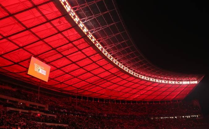 Olympiastadion Sportstätte Übersicht in Rot Fußball Fussball UEFA Champions League UCL Herren 6.Spieltag Saison 2023 2024 12.12.2023 1.FC Union Berlin FCU vs Real Madrid Olympiastadion DFL regulations prohibit any use of photographs as image sequences and or quasi-video