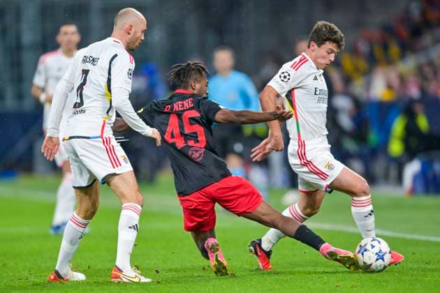 SOCCER - UEFA CL, RBS vs Benfica SALZBURG,AUSTRIA,12.DEC.23 - SOCCER - UEFA Champions League, group stage, Red Bull Salzburg vs SL Benfica. Image shows Fredrik Aursnes (Benfica), Dorgeles Nene (RBS) and Joao Neves (Benfica).  GEPAxpictures xChristianxMoser