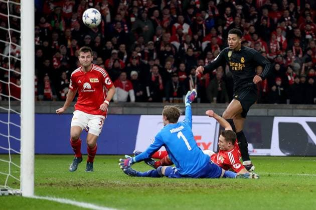 12.12.2023, xtgx, Fussball UEFA Champions League, Union Berlin - Real Madrid emspor, v.l. Robin Knoche (1. FC Union Berlin) Frederik Roennow (1. FC Union Berlin) Jude Bellingham (Real Madrid) Paul Jaeckel (1. FC Union Berlin) Zweikampf, Aktion, action, battle for the ball (DFL DFB REGULATIONS PROHIBIT ANY USE OF PHOTOGRAPHS as IMAGE SEQUENCES and or QUASI-VIDEO) Berlin