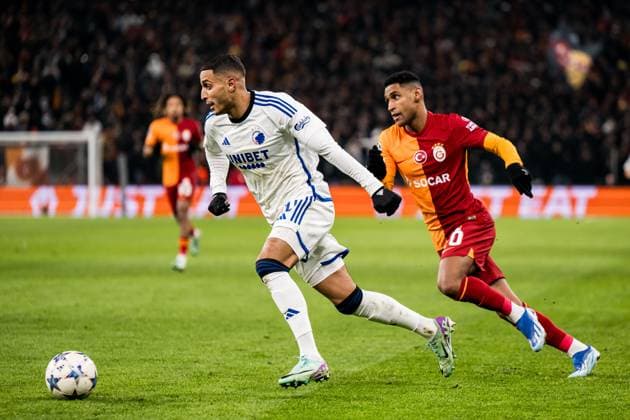 231212 Elias Achouri of FC Copenhagen and Nicolai Boilesen of Galatasaray during the UEFA Champions League football match between FC Copenhagen and Galatasaray on December 12, 2023 in Copenhagen. Photo: Petter Arvidson BILDBYRAN kod PA PA0704 fotboll football soccer fotball champions league fc copenhagen galatasaray bbeng Copyright: PETTERxARVIDSON BB231212PA031