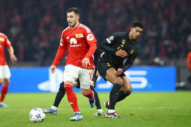 12.12.2023, xtgx, Fussball UEFA Champions League, Union Berlin - Real Madrid emspor, v.l. Jude Bellingham (Real Madrid) Josip Juranovic (1. FC Union Berlin) Zweikampf, Aktion, action, battle for the ball (DFL DFB REGULATIONS PROHIBIT ANY USE OF PHOTOGRAPHS as IMAGE SEQUENCES and or QUASI-VIDEO) Berlin
